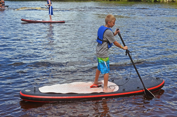 Boy on a Paddle Board - Photo, Image