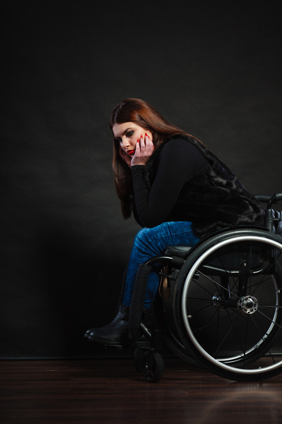 Sad girl on wheelchair. - Foto, Imagen