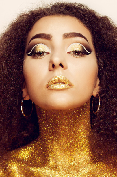 Magic Girl Portrait in Gold. Golden Makeup - Foto, Imagem