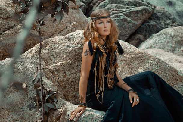 young beautiful boho woman on the rocks - Fotoğraf, Görsel