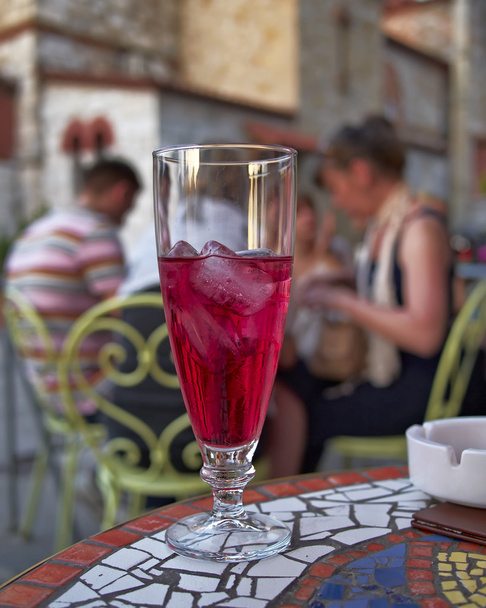 Ice tea with grenadine syrup and chatting - Photo, Image