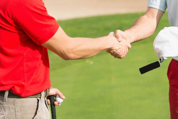 golfers shaling τα χέρια - Φωτογραφία, εικόνα