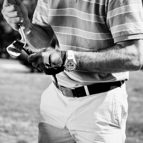 Golfer schoonmaak ijzer Golfclub - Foto, afbeelding