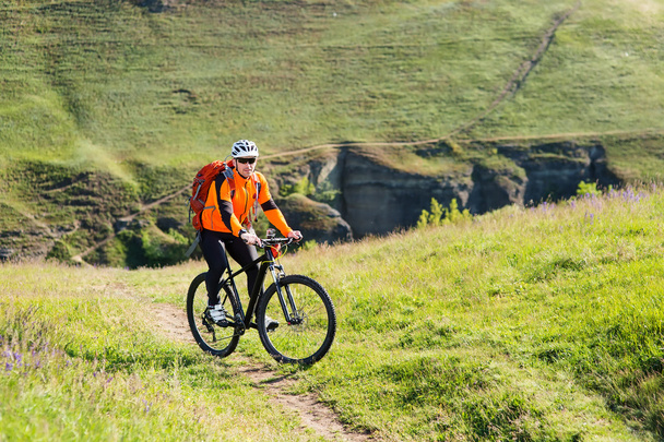 Cyclist on the Beautiful Meadow Trail - Photo, Image