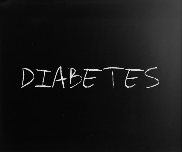 Слово "диабет" написано от руки белым мелом на доске
 - Фото, изображение