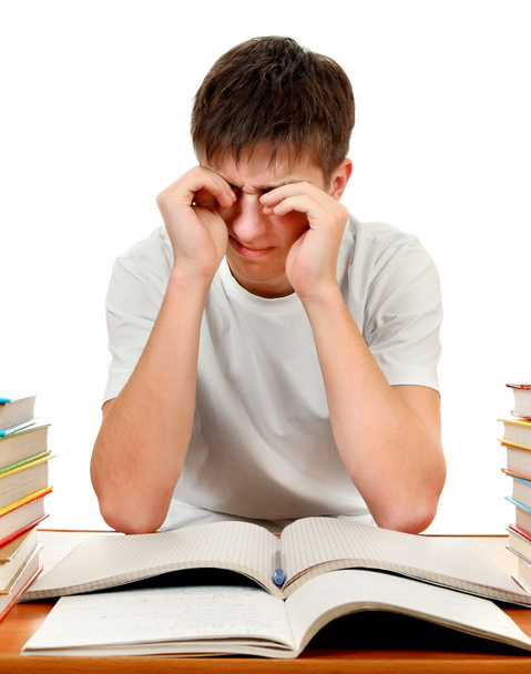 Уставший ученик с книгами
 - Фото, изображение