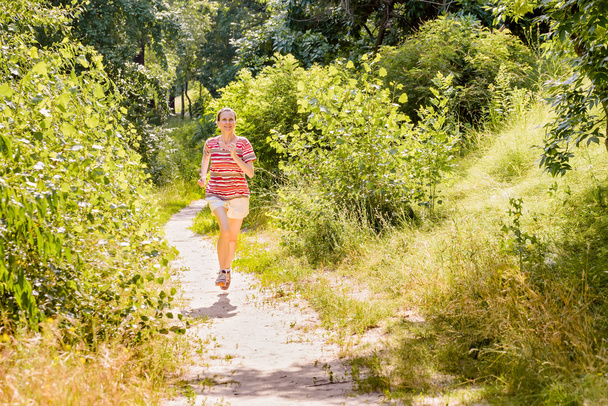 Senior Woman Running in the Forest - Foto, Imagem