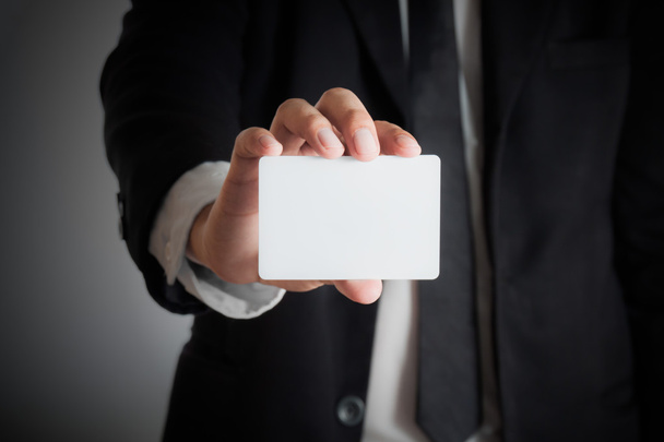 Man's hand showing blank  business card  - Photo, Image