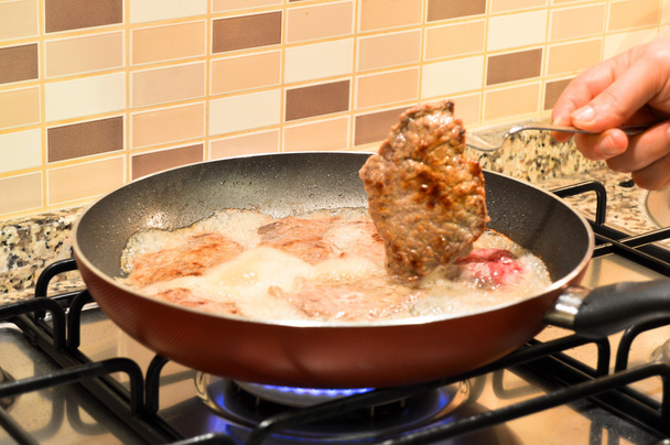 Frying breaded red meat - Photo, Image