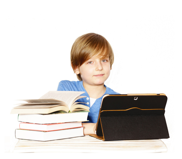 cute young boy with books and electronic tablet - Фото, зображення
