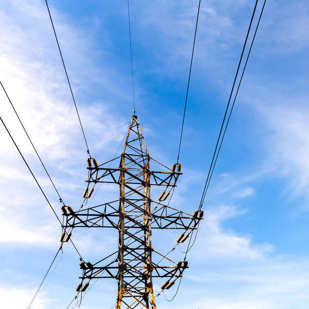 electrical high voltage tower on a blue sky background - 写真・画像