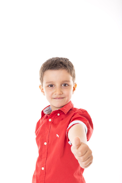 Portréja egy magabiztos fiú mutatja a hüvelykujjával felfelé a elszigetelt fehér - Fotó, kép