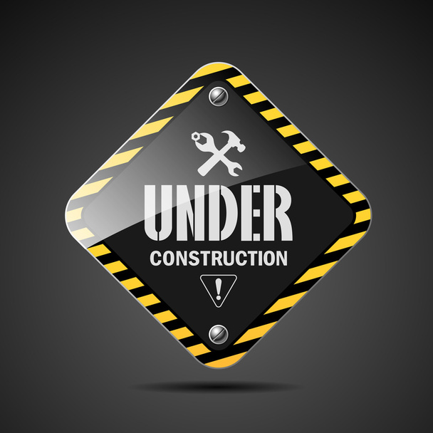 Under construction sign on black background - Vector, Image