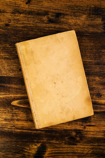Old vintage book on rustic wooden table - Foto, Imagem
