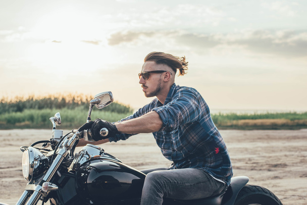 man riding motorcycle - 写真・画像