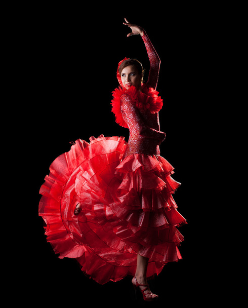 Woman dance spain flamenco in red oriental costume - Foto, Imagen