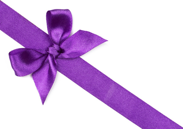 Purple Thin Ribbon With Bow Composition, Isolated On White Stock Photo,  Picture and Royalty Free Image. Image 31539003.