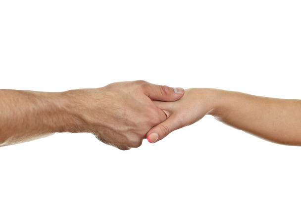 Man delicately shaking woman's hand. Isolated on white. - Photo, Image