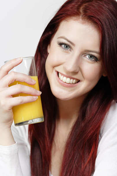 Happy woman with fresh Orange juice - Фото, изображение