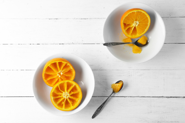 Eating oranges with spoon  - Foto, imagen