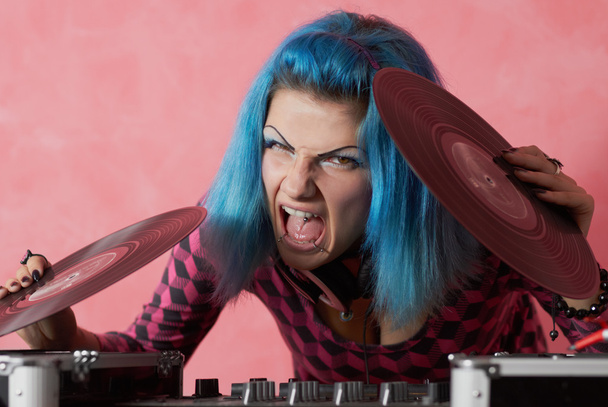 Punk girl DJ with dyed turqouise hair - Photo, Image