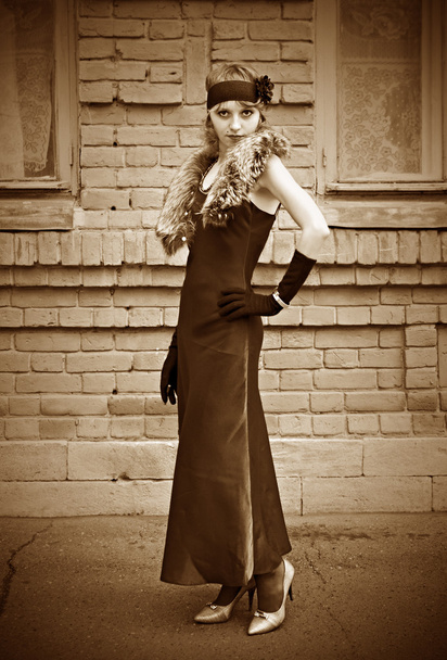 Girl in a vintage dress. Retro stylization - 写真・画像