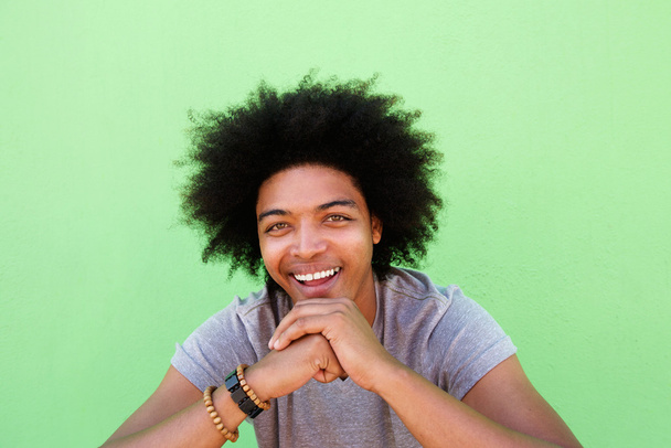 Smiling young african american man with afro  - Foto, Bild