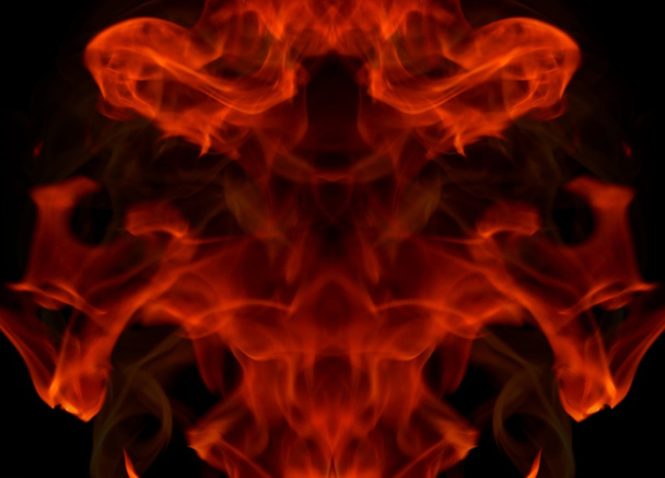 黒の背景に激しい炎火の抽象的なテクスチャ - 写真・画像