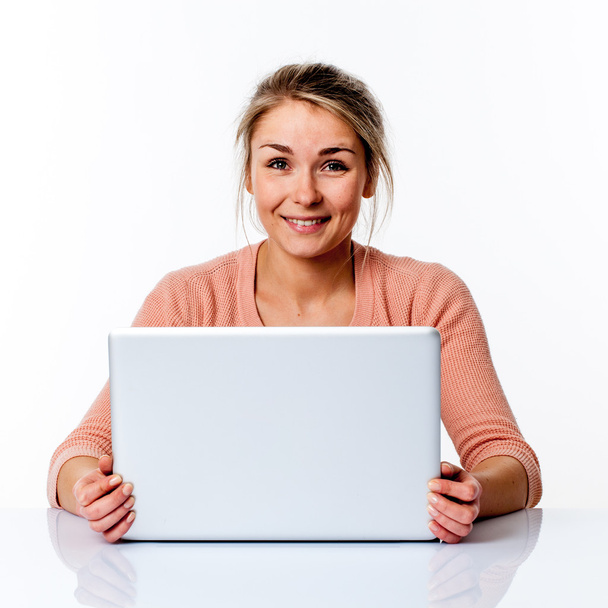 thrilled beautiful blond girl with computer, fun and wellbeing - Фото, изображение