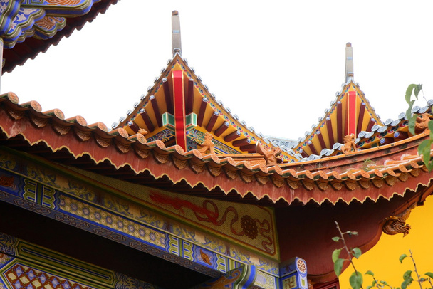 Chinese style roof eaves, Huating buddhist temple. - 写真・画像