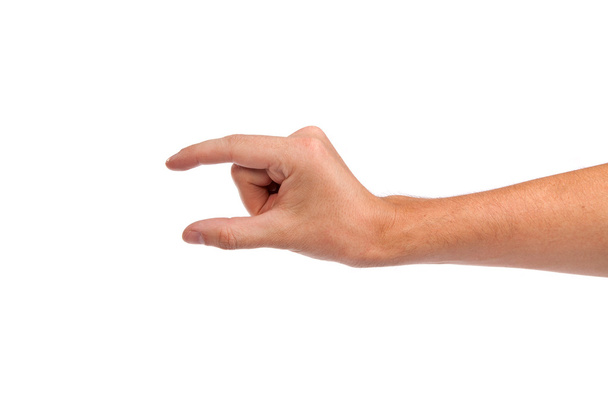 Male hand reaching for something on white - Φωτογραφία, εικόνα