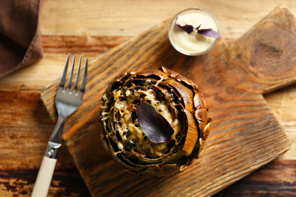 baked  artichoke with lemon  - Photo, image