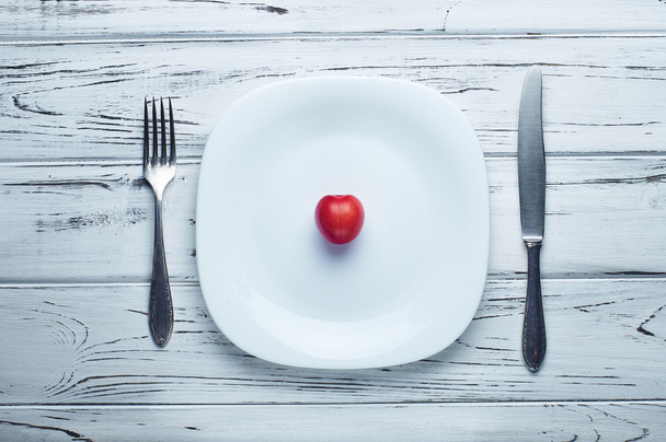 Plum / Cherry plum / cherry on a plate. Food for a rigid diet. - Φωτογραφία, εικόνα