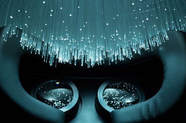 Auriculares VR negros y fondo de fibra óptica
  - Foto, Imagen
