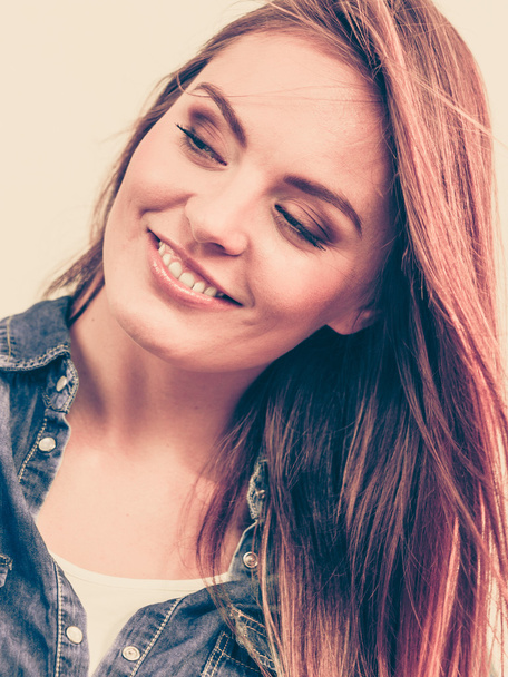 Happy smiling woman wearing jeans - Фото, изображение