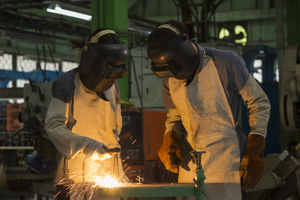 lavoratori con maschera di protezione saldatura in acciaio
 - Foto, immagini