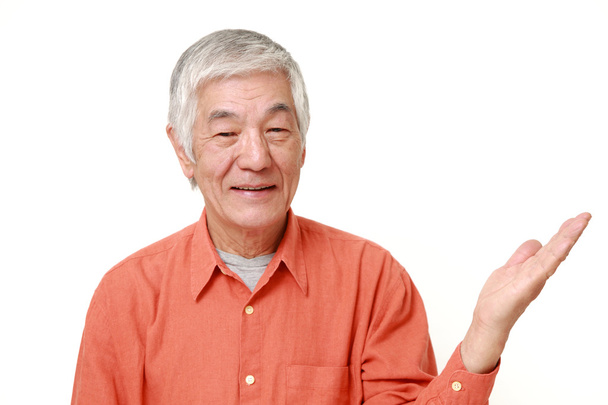 senior Japanese man presenting and showing something - Фото, изображение