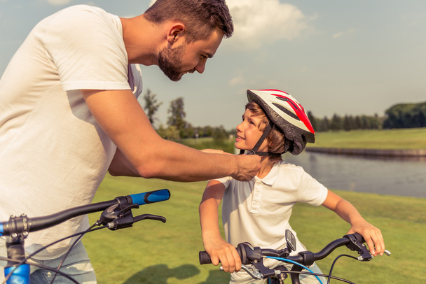 Dad and son cycling - Photo, Image