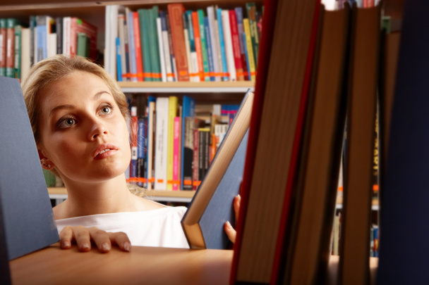 Girl in library - Photo, Image