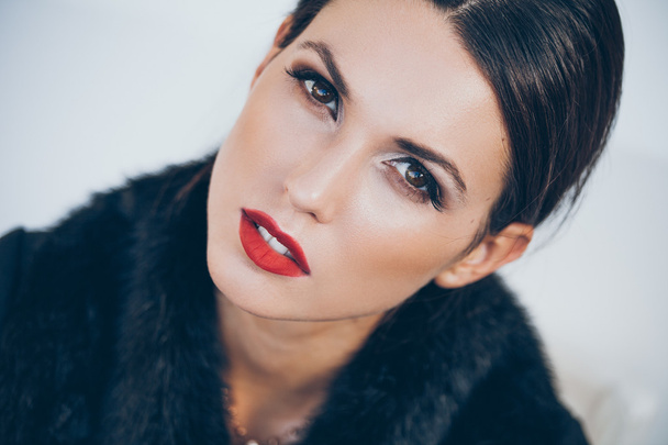woman with brown eyes and red lipstick - Foto, imagen
