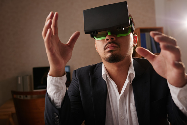 Businessman in VR goggles  - Photo, Image