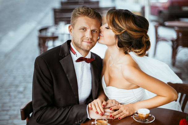 Loving married couple sitting in cafe - Photo, Image