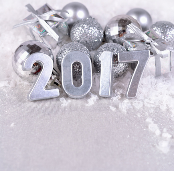 2017 year silver figures and silvery Christmas decorations - Foto, Imagem