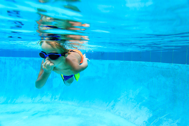 little boy learns swimming underwater - Фото, изображение