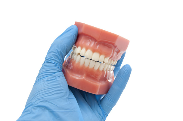 οδοντίατρος δείχνουν ορθοδοντικού αποτελέσματος χαμογελαστό οδοντιατρικής - Φωτογραφία, εικόνα