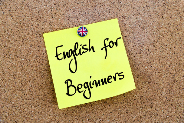 Yellow paper note pinned with Great Britain flag button tack and text English For Beginners
 - Фото, изображение