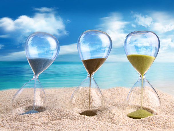 Three hourglass in the sand - Photo, Image