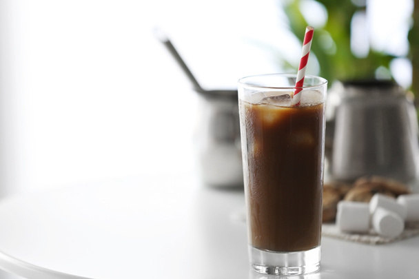 Iced coffee with straw   - Valokuva, kuva