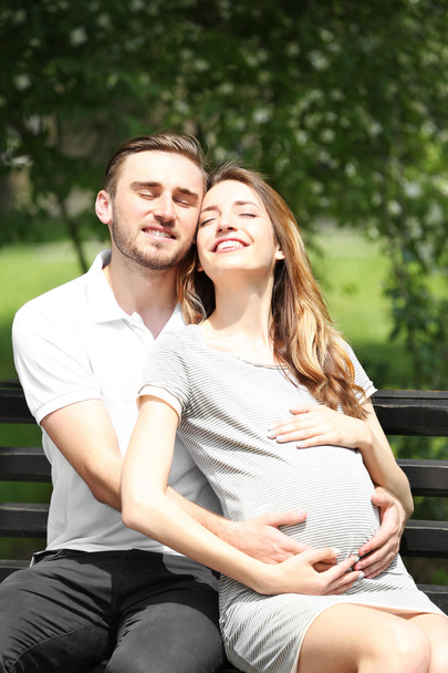 Happy pregnant woman and her man  - Фото, изображение