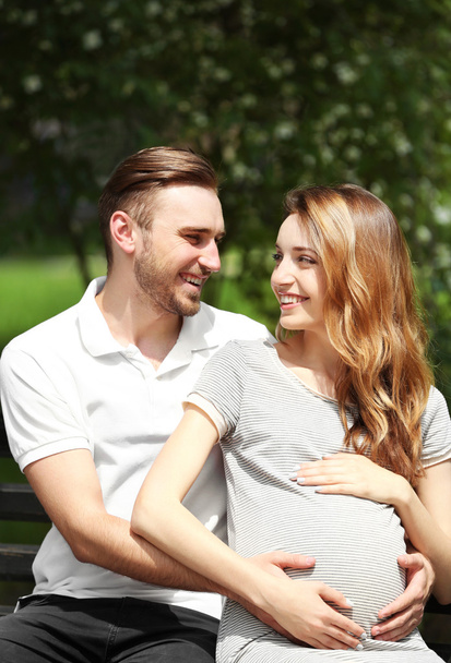 Happy pregnant woman and her man - Фото, изображение
